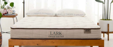Lark Kids Natural Mattress in a bedroom setting